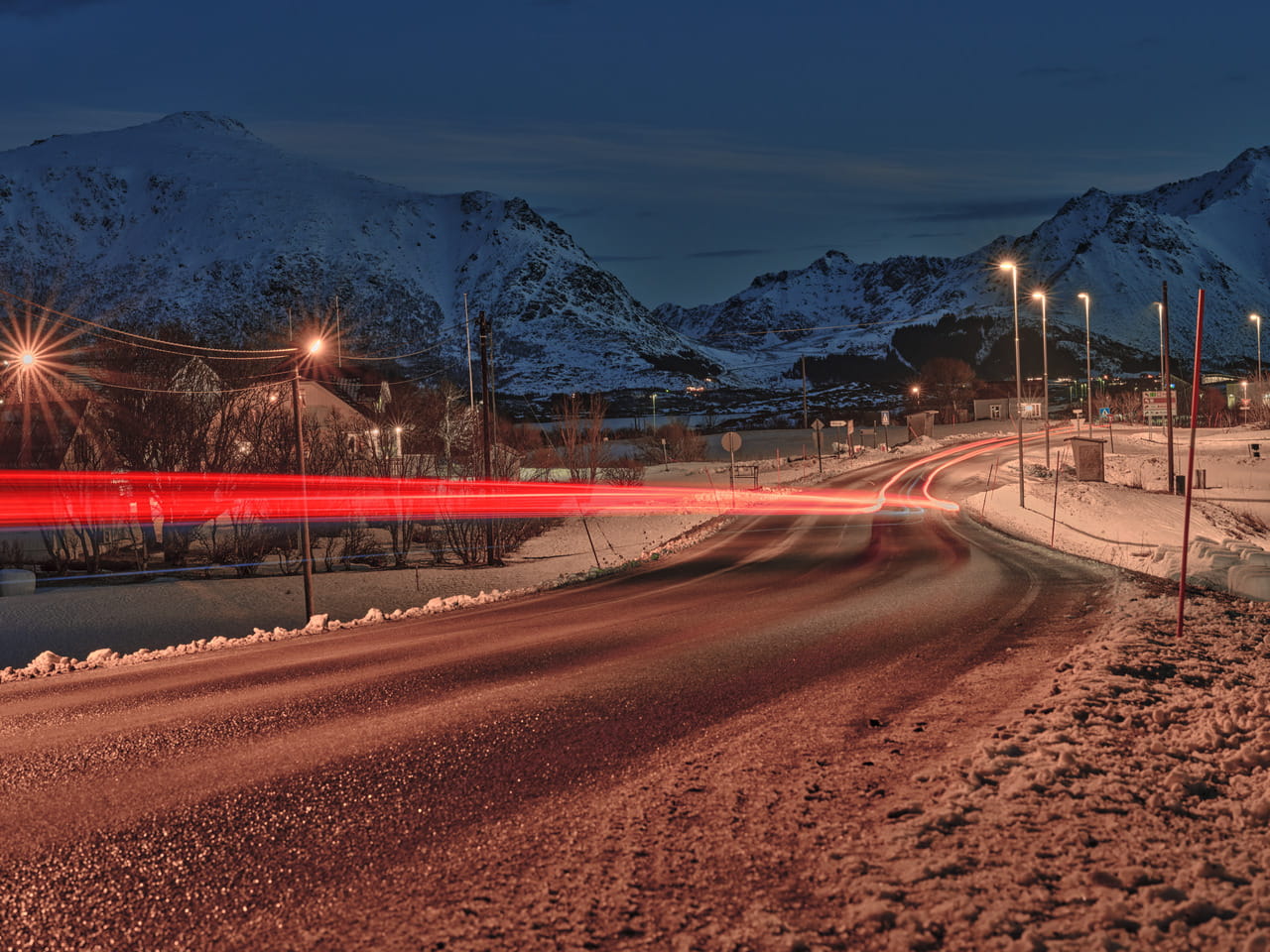 A road and mountains at the end